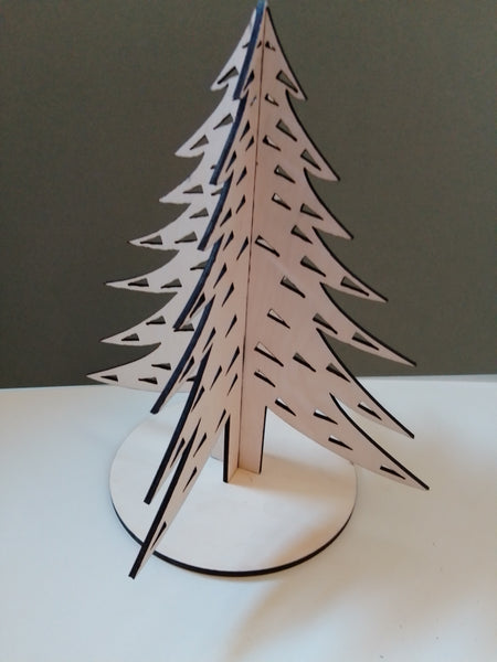 3D Christmas tree with small triangles cut through 