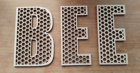 Honeycomb letters in various sizes