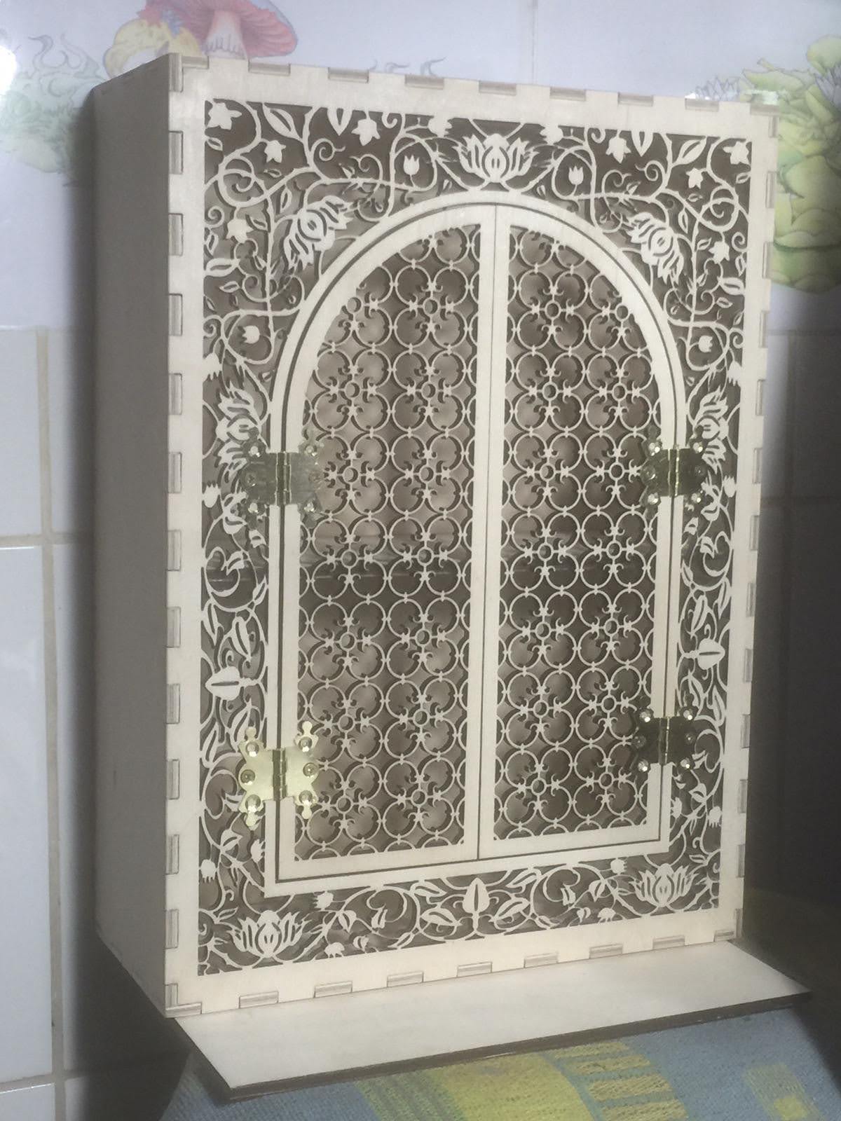 Intricate Arched Door Cabinet