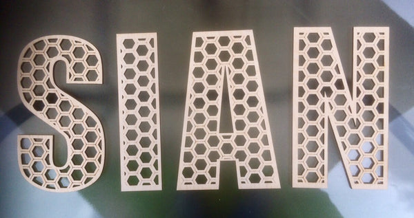 Honeycomb letters in various sizes